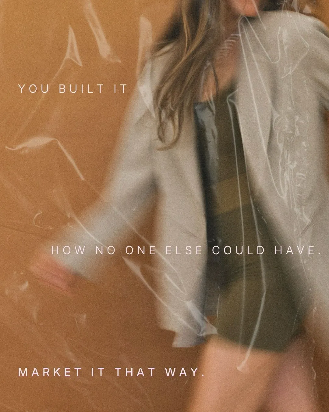 Poster-style image with a blurred woman in a coat behind plastic wrap; text reads: 'YOU BUILT IT', 'HOW NO ONE ELSE COULD HAVE', 'MARKET IT THAT WAY'.