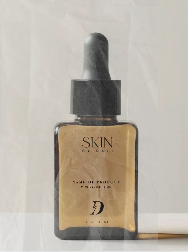Dropper bottle of Skin by Dali serum with amber liquid and black pump cap.